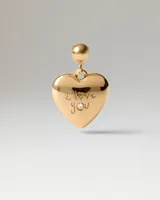 Charm en forma de corazón dorado, con grabado "I Love You" y detalle de circonia incrustada.