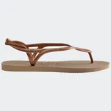 Ojotas Havaianas modelo Luna, color negro, con diseño de tiras trenzadas que se entrelazan en la parte delantera y correa trasera para mayor sujeción.
