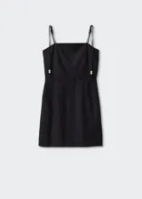 Vestido corto negro de lino con tirantes finos ajustables con lazada y detalle de abalorios.