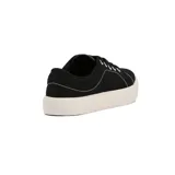 Championes casual de lona color negro con suela plataforma blanca acanalada. Presenta costuras decorativas en hilo blanco contrastante y ojales metálicos blancos.