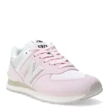 Championes urbanos New Balance modelo 574, color rosado con detalles en blanco y beige. Confeccionados en gamuza y malla, presentan el logo N característico en los laterales y entresuela con tecnología ENCAP para mayor soporte y estabilidad.