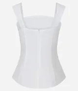 Blusa peplum sin mangas confeccionada en viscosa blanca con escote recto, breteles anchos y traspase delantero. Presenta tejido texturizado, adorno en los breteles y forro.