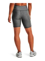 Calza corta de entrenamiento Under Armour, confeccionada en tejido HeatGear ultraligero y elástico. Presenta un diseño de talle alto con cintura elástica, costuras planas ergonómicas para mayor comodidad y bolsillo frontal integrado.