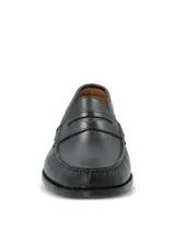 Zapato mocasín Cazzoli de cuero color negro, de diseño clásico con empeine estructurado y costuras visibles en el contorno de la puntera.