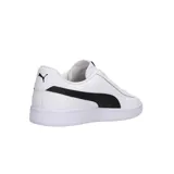 Championes Puma modelo Smash V2 L, de diseño clásico y minimalista en color blanco con la icónica franja lateral en negro. Confeccionados con materiales sintéticos de alta calidad, cuentan con suela de goma resistente y cierre de cordones para un ajuste seguro.