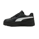 Championes Puma modelo Karmen Classic con plataforma, de color blanco con detalle de franja lateral en negro y logo plateado.