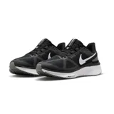 Championes de running Nike Air Zoom Structure 25, color negro con detalles en azul y blanco. Presentan tecnología Air Zoom en la suela para mayor amortiguación y soporte.