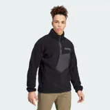 Buzo de tela fleece gruesa Adidas Terrex de color negro, con cuello alto, cierre frontal parcial con botones a presión, bolsillo frontal con solapa y el logo de Terrex en el pecho.