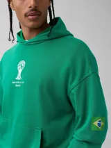 Canguro rojo con capucha, bolsillo frontal tipo canguro y estampado circular blanco en el pecho con temática de la Copa Mundial de 1966.