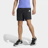 Short deportivo Adidas color negro con logo blanco en la pierna izquierda. Confeccionado en tejido elástico con tecnología CLIMACOOL que absorbe y dispersa el sudor.