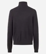 Suéter de punto color crema con cuello alto y mangas largas. Presenta un diseño ajustado al cuerpo con puños acanalados.