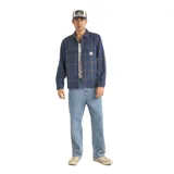 Camisa a cuadros azul con marrón, de manga larga y dos bolsillos frontales con botón.