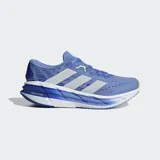 Championes de running Adidas Adistar 4, color azul con detalles en blanco, celeste y amarillo flúor. Presentan un diseño con mediasuela REPETITOR de gran volumen y estructura esculpida en tonos de azul, y tres franjas blancas laterales.