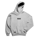 Canguro gris melange de felpa con capucha ajustable con cordón, bolsillo tipo canguro al frente, puños y dobladillo acanalados. Cuenta con un parche rectangular negro con la inscripción "EMEXEM CLOTHES WITH SOUL" en el pecho y una etiqueta pequeña en el bolsillo.