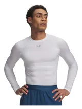 Remera térmica de compresión Under Armour HeatGear de manga larga, color blanco, con cuello redondo y logo de la marca en el centro del pecho. Diseñada con tecnología de secado rápido y tejido elástico para mayor movilidad.