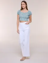 Jean wide leg de tiro alto marca Dictionary, color negro, con pretina con pasadores, botón, cierre y bolsillos delanteros y traseros.