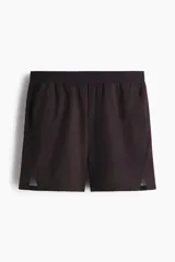 Short deportivo negro H&M en tejido funcional con tecnología DryMove™, de corte estándar, cintura elástica con cordón ajustable, bolsillos laterales y aberturas en el dobladillo.