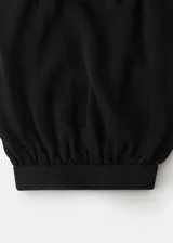 Pantalón balloon negro de punto fino y elástico, de diseño largo con cintura ajustable con goma y bajo con goma elástica.