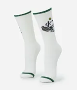 Par de medias de caña larga color blanco, con bordes verdes y estampado del personaje Snoopy jugando al tenis.