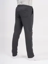 Pantalón deportivo azul petróleo, de corte recto y tiro alto, con cintura elástica ajustable con cordón.