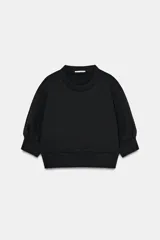 Sudadera crop de algodón con cuello redondo y mangas cortas abullonadas con puños ajustados.