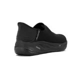 Championes Austral sin cordones, color negro, confeccionados en tejido de punto transpirable. Presentan suela con tecnología Cushion Gel para mayor amortiguación y detalle de marca en el talón.
