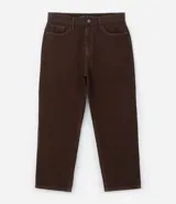 Pantalón baggy negro de sarga de algodón, con cintura fija con trabillas, botón contrastante y cierre por cremallera oculto, bolsillos laterales y traseros. Modelo holgado de corte recto y ancho.