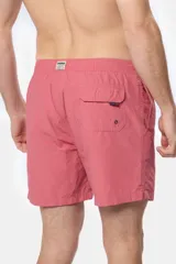 Short de baño negro liso, con cintura elástica y cordón regulable, dos bolsillos laterales y suspensor de malla fina.