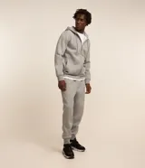 Pantalón deportivo Get Over de corte recto con puños elásticos en los tobillos, cintura con cordón ajustable y bolsillos laterales.