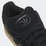 Championes Adidas Campus 00s negros con detalles en gamuza y suela color caramelo. El lateral externo presenta la palabra 'Campus' en letras doradas. Fabricados con material CORDURA® resistente a la abrasión.