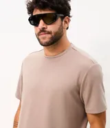 Remera deportiva Get Over de color azul marino, confeccionada en tech fleece con tecnología dry de secado rápido, cuello redondo y manga corta, de corte holgado.