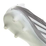 Championes de fútbol Adidas Copa Pure IV League FG/MG, color plateado metalizado con las icónicas tres tiras de la marca en blanco en los laterales.