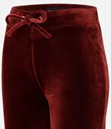 Pantalón de jogging de corte recto confeccionado en plush, con cintura elástica ajustable mediante cordón. Presenta un diseño minimalista y cómodo, ideal para uso diario.
