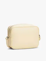 Bandolera Tommy Jeans color crema, con correa ajustable y logo de la marca en relieve.