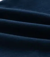 Pantalón skinny negro de sarga con elastano, estilo social, con cierre de botón y cremallera, y cintura con trabillas.