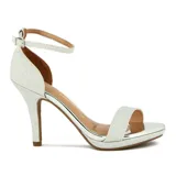 Sandalia de tacón alto Vizzano, color dorado con acabado de glitter, plataforma delantera, tira frontal y tira ajustable al tobillo con hebilla.