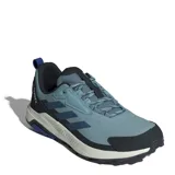 Championes de trekking Adidas Terrex Anylander, color celeste con detalles en negro y suela en tono gris claro. Presentan diseño de malla transpirable con refuerzos sintéticos, cordones ajustables y logo Terrex en el lateral y la lengüeta.