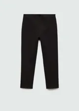 Calza capri negra de tiro alto con cintura elastizada, corte skinny y cierre lateral invisible.