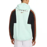 Campera deportiva Nike de la selección de Francia, con cierre frontal completo y capucha. Presenta un diseño en color verde agua con paneles laterales en negro y marrón, logo de la marca y escudo de la federación en el pecho.