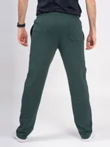 Pantalón deportivo azul petróleo, de corte recto y tiro alto, con cintura elástica ajustable con cordón.