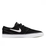 Championes de skate Nike SB modelo Zoom Janoski, color negro con swoosh blanco en el lateral y suela de goma blanca vulcanizada.