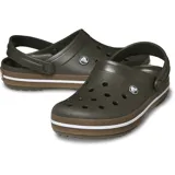 Zuecos Crocs modelo Crocband Clog Gum, color negro con banda lateral en tono caramelo y línea blanca. Diseño con orificios de ventilación, tira trasera pivotante y suela cómoda de espuma Croslite.