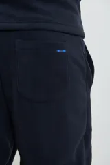 Pantalón de jogging azul marino de micropolar, con cintura elástica y puños ajustados.