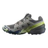 Championes Salomon Speedcross 6 de color negro, diseñados específicamente para trail running. Presentan una estructura robusta y técnica, capellada sintética y textil con refuerzos termosellados, sistema de cordones de ajuste rápido Quicklace y suela con tacos profundos para máxima tracción en terrenos difíciles.