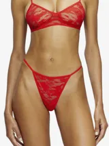 Colaless negra de encaje jacquard elástico con motivo camuflado y logo Oval D aplicado en el frente.