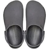 Zuecos Crocs modelo Classic Crafted, de color beige, con parte superior de lona textil lavada, suela Croslite y correa de talón pivotante.