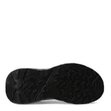 Championes urbanos sin cordones, confeccionados en tejido de punto elástico color negro, con suela de goma robusta y diseño ergonómico.