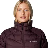 Campera puffer de mujer Columbia, modelo Powder Lite II, con tecnología termorreflectante Omni-Heat y tratamiento repelente Omni-Shield. Presenta cierre frontal completo, cuello alto con protección de barbilla, bolsillos laterales con cierre y dobladillo ajustable con cordón.