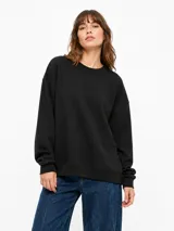 Buzo negro de cuello redondo, con mangas largas y puños elásticos acanalados, de diseño holgado y estilo básico.