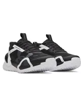 Championes de entrenamiento Under Armour modelo UA W Reign XT para mujer, en color negro con detalles en blanco y gris. Cuentan con capellada de malla transpirable, refuerzos de TPU, mediasuela de amortiguación UA HOVR y suela de diseño estructurado para mayor estabilidad.